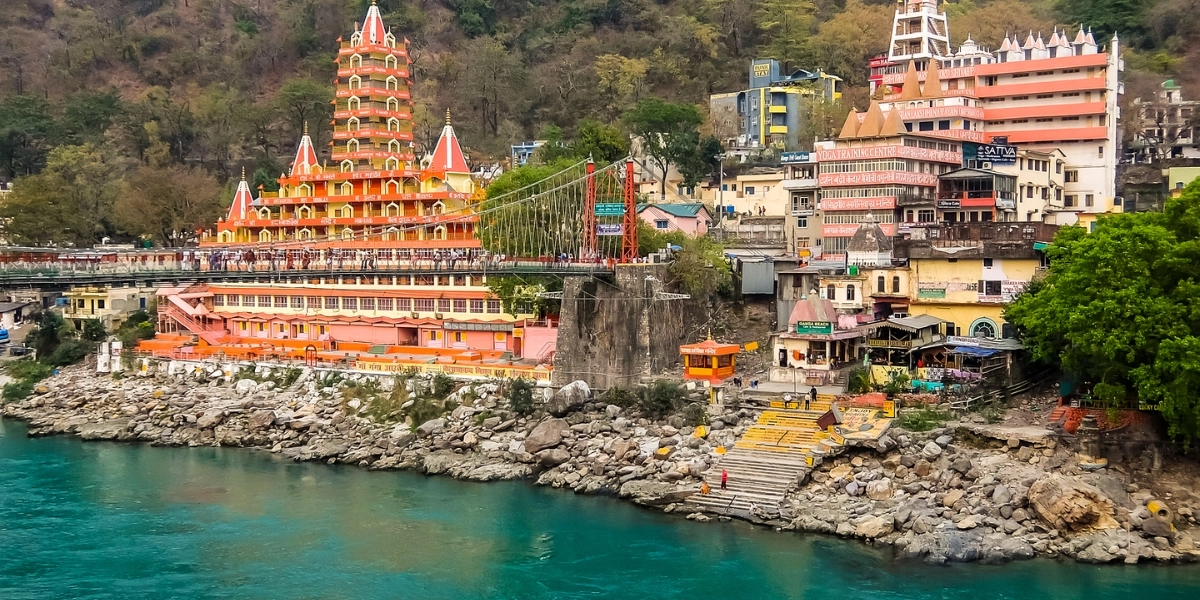 Scenic view of Rishikesh with Ganga river and Himalayan foothills during pleasant April weather