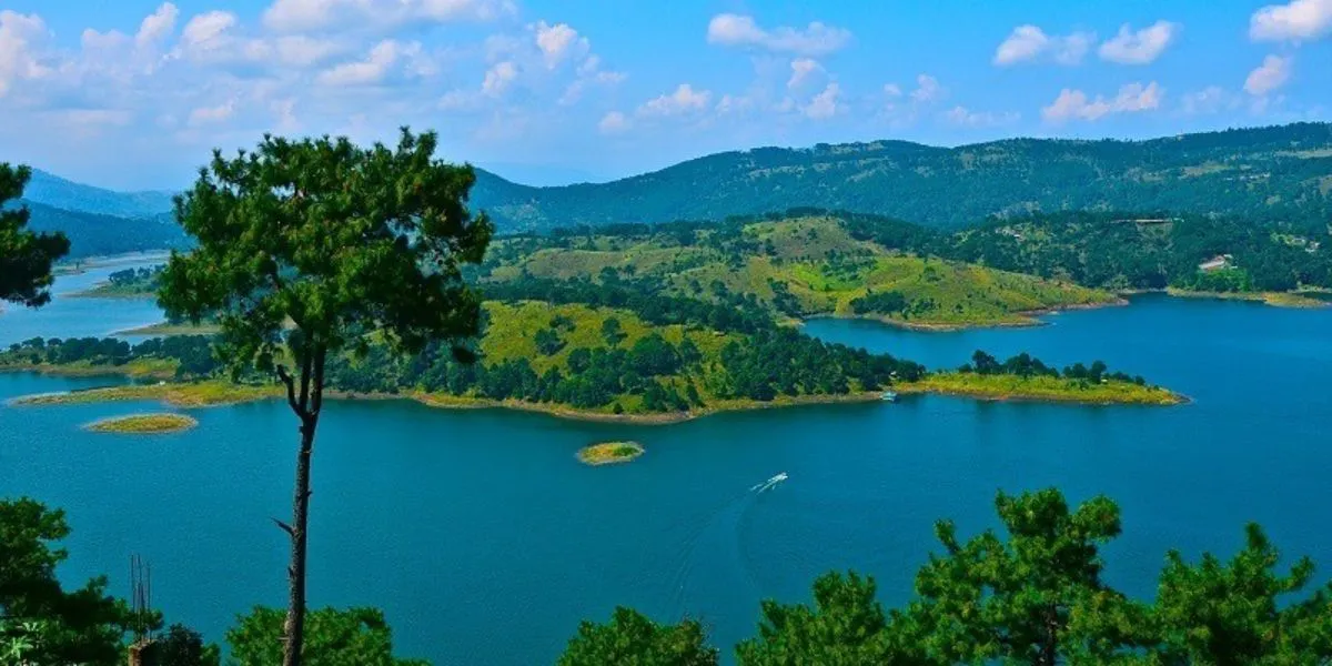 Umiam Lake surrounded by green hills in Shillong Meghalaya during April