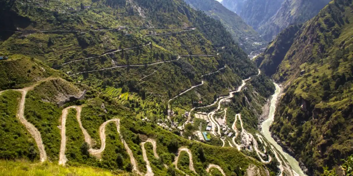 Scenic mountain road leading towards Badrinath in the Himalayas