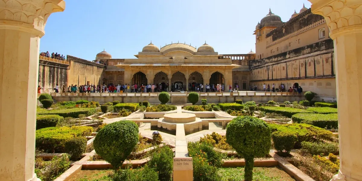 Amer Fort Jaipur historic architecture Amer Fort architecture with grand arches and sunrise glow