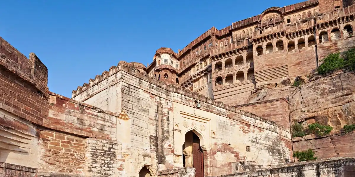 Mehrangarh Fort and blue city Jodhpur View of Mehrangarh Fort towering over blue-painted houses of Jodhpur