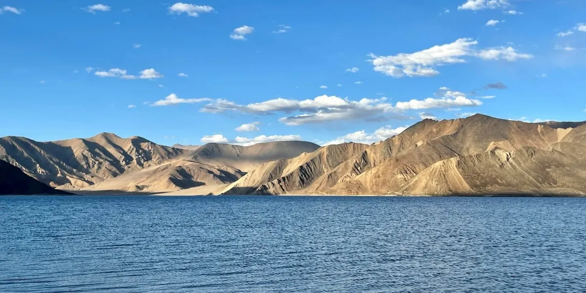 Crystal-clear Pangong Lake and barren mountains in Leh-Ladakh