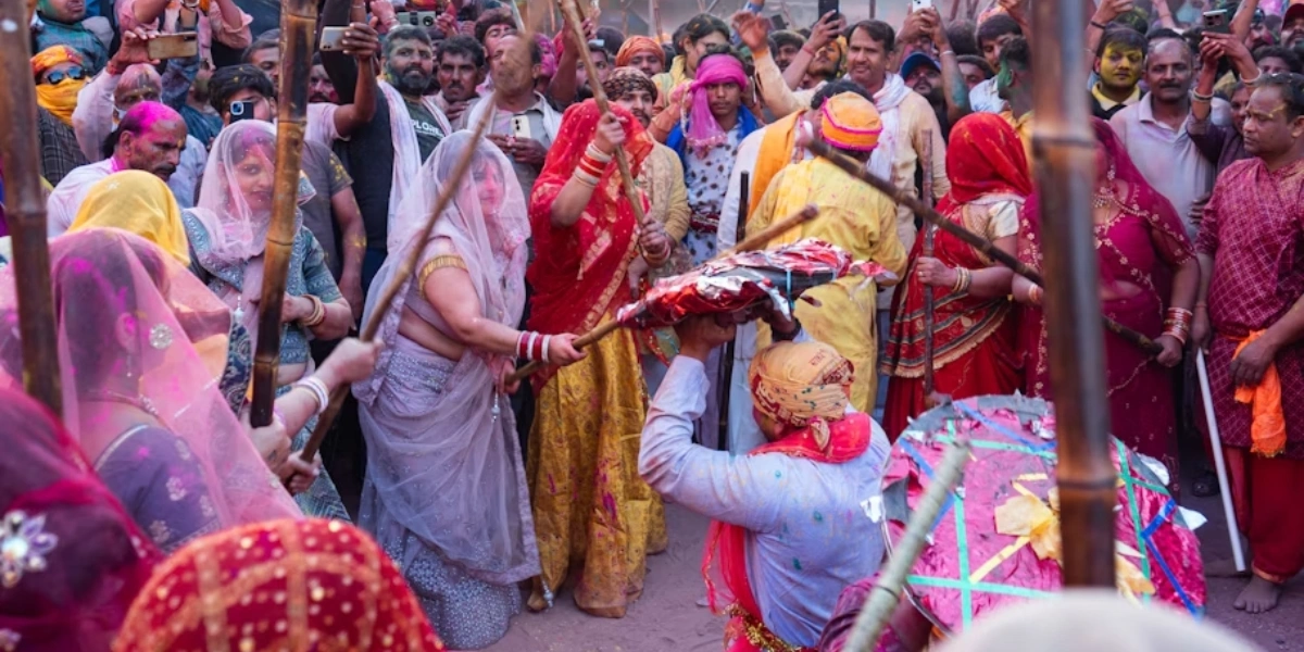 Lathmar Holi Festival in Barsana 2026 Women playing Lathmar Holi in Barsana during Holi 2026 celebrations