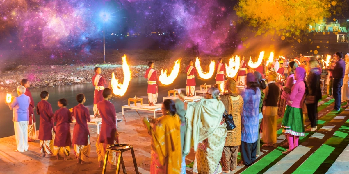 Holi Celebration by the Ganges in Rishikesh Devotees celebrating Holi 2026 near the Ganges River in Rishikesh